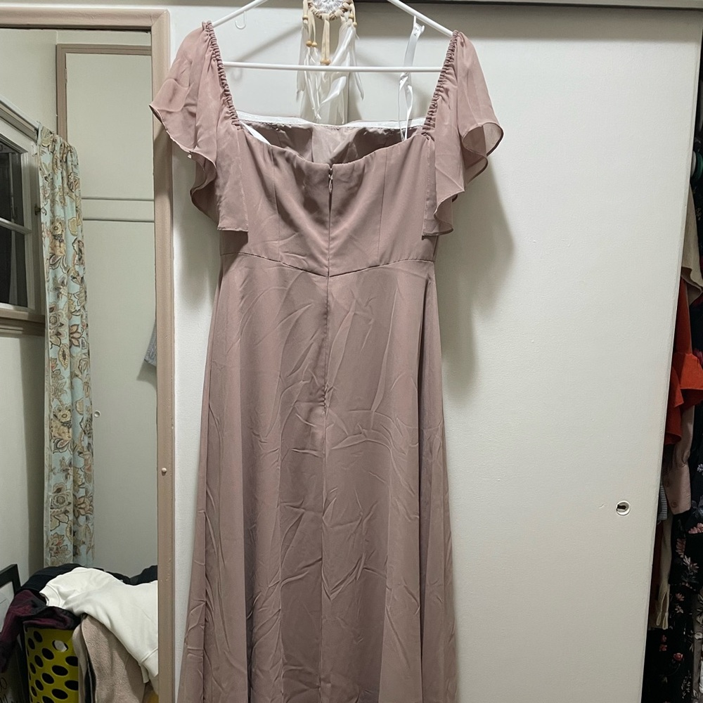 Women’s off the shoulder, slitted bridesmaid dress.